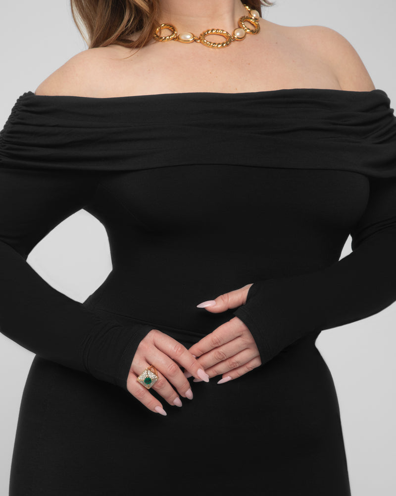 Model wears Shapey Off Shoulder Ruched Midi Shapewear Dress - Black close up of the shoulder area