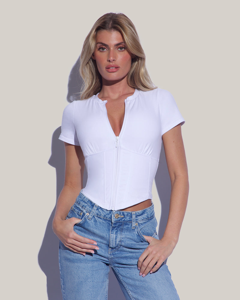 Model wears Short Sleeve Corsety Sculpting Shapewear Top - White with jeans front view