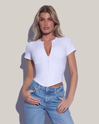 Model wears Short Sleeve Corsety Sculpting Shapewear Top - White with jeans front view