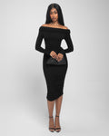 Model is posing in Shapey Off Shoulder Ruched Midi Shapewear Dress - Black