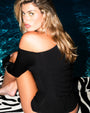 Model is posing in Shapey Long Sleeve One Shoulder Sculpting Shapewear Top - Black look back