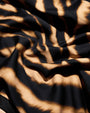 Close-up of Seamed Lushy Halter Shapewear Midi Dress - Contour Golden Zebra fabric