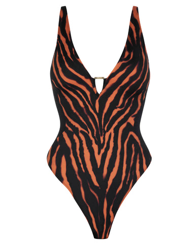 Model wears Hi Cut Plungey Triangle Shapewear Swimsuit - Clay Zebra/Black side view