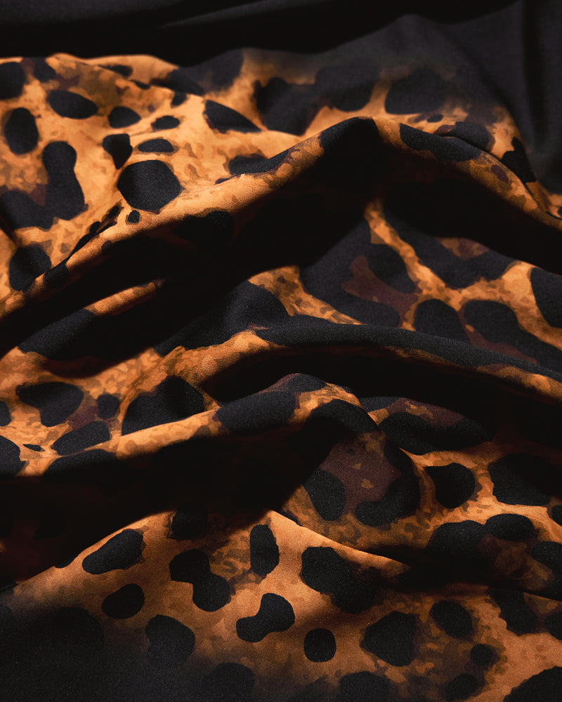 Close-up of Corsety Off Shoulder Pencil Shapewear Dress - Symmetric Leopard fabric