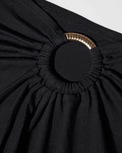 Close up image of the gold hardware and material on Ringy Mini Skirty - Black