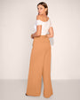 Model wears Belted Wide Leg Ponte Pant - Camel full body back view