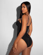 Model wears Bombshell Sculpting Bra-Sized Shapewear Swimsuit - Black side view