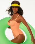 Model is posing in Bombshell Sculpting Bra-Sized Shapewear Swimsuit - Papaya