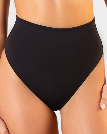 Close up of Brazilian Smoothing Kini Bottom - Black on model