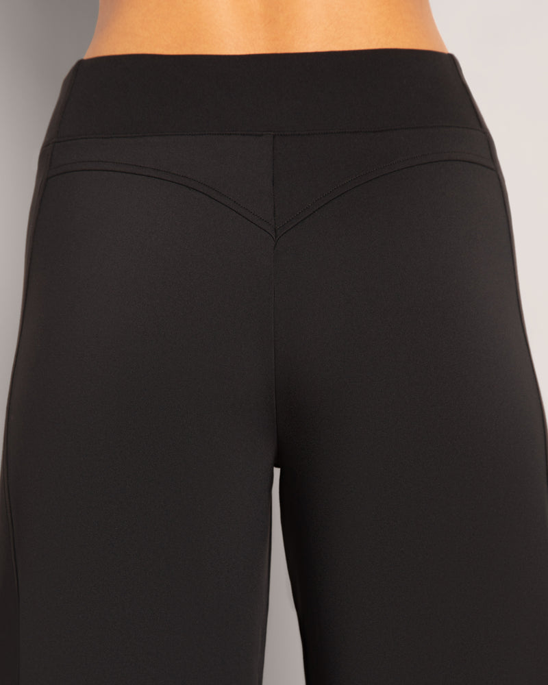 Zoomed in image of the Cloudlined Wide Leg Pant - Soft Black showing the yolk detail on the back