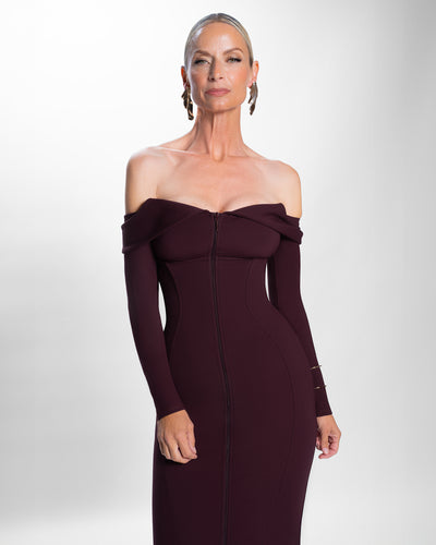 Model wearing Corsety Off Shoulder Long Sleeve Pencil Dress - Garnet without removable straps front view
