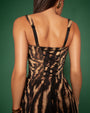 Model wears Goddessy Maxi Shapewear Dress - Golden Zebra close up back view