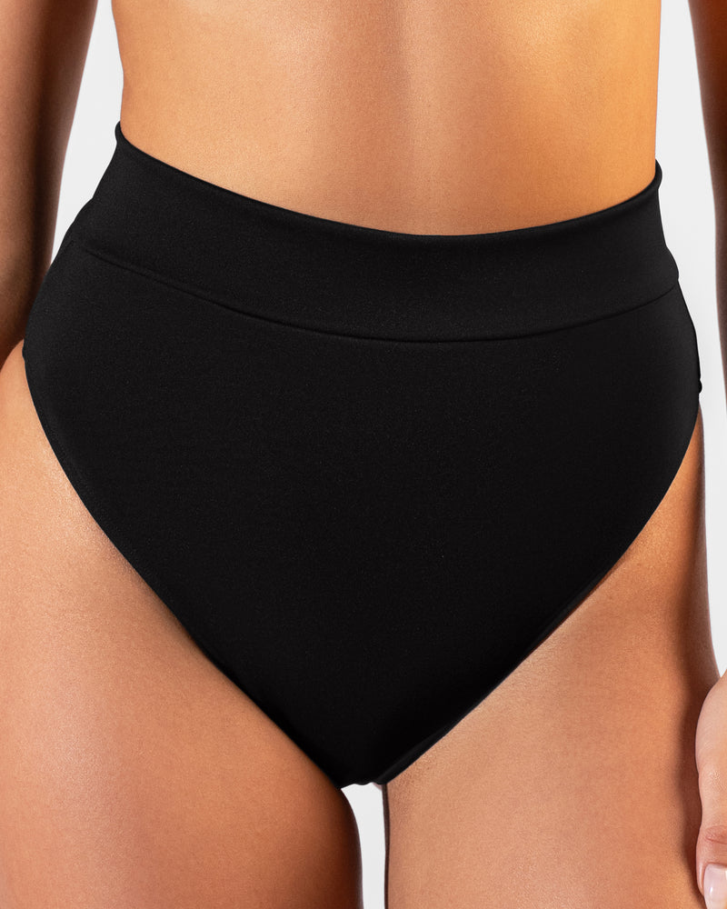 Close up image of Hi Cut Adjustable Kini Bottom - Black on model