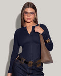 Model is posing in Long Sleeve Corsety Sculpting Shapewear Top - Midnight front view zipped up