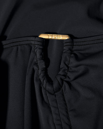 Detail shot of hardware on the Mini Triangle Skirty - Black