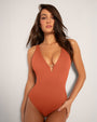 Model wears Plungey Triangle - Baked Clay One Piece Shapewear Swimsuit full front view