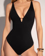 Model wears Plungey Triangle - Black Once Piece Shapewear Swimsuit detail close up front