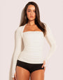 Model wears Shapey Ruched Long Sleeve Shapewear Top - Eggshell front view