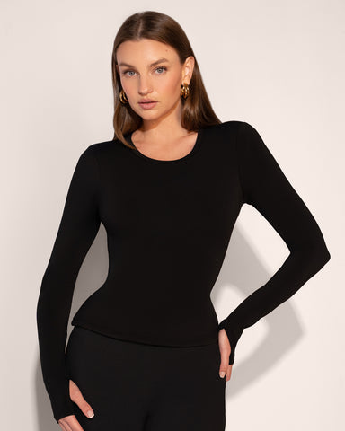 Model wears Shapey Crew Neck Long Sleeve Shapewear Top - Soft Sheen Jersey Black