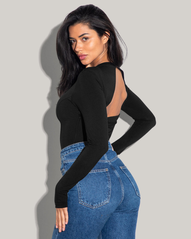 Model wears Shapey Crew Neck Long Sleeve Sculpting Shapewear Top - Soft Modal Jersey Black side view