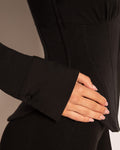 Model wears Shirty Long Sleeve Shapewear Top - Black close up on a sleeve