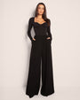 Model wears Pleaty Wide Leg Pleated Pant - Black with top full front view