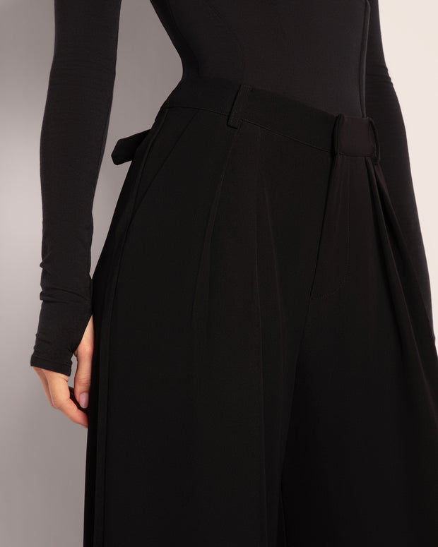 Model wears Pleaty Wide Leg Pleated Pant - Black close up