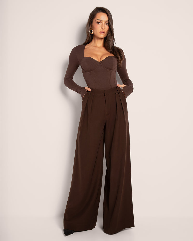 Model wears in Sweetie Long Sleeve Sculpting Shapewear Top - Espresso and pants full front view