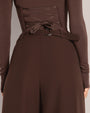 Model wears Pleaty Wide Leg Pleated Pant - Espresso back view close up