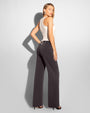 Model is posing in Swuity Medium Rise Relaxed Wide Leg Pant - Graphite side view