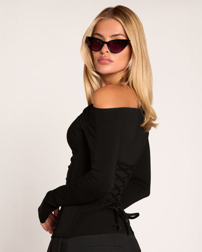 Close up of model in Shapey Bias Long Sleeve Top - Black back view