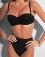 Close up shot of model in Hi Cut Smoothing Kini Bottom - Black paired with TA3 Bombshell Top - Black