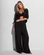 Model wearing Seersucker Gauze Flowy Pant - Black with matching button up top