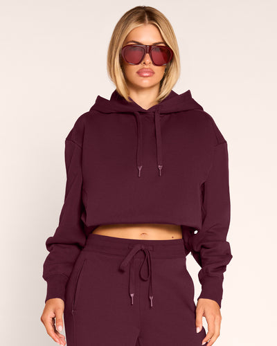 Model wearing Convertible Fleecey - Garnet at the cropped length