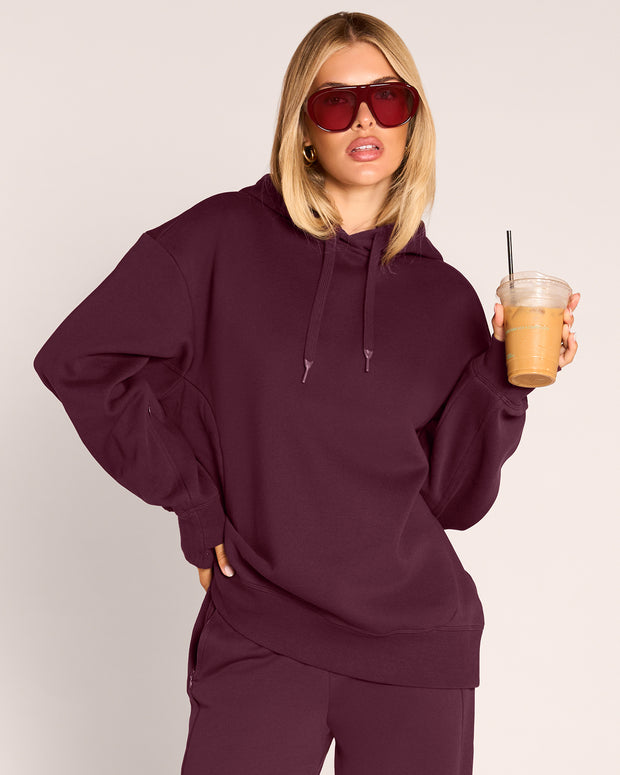 Front view of model wearing Convertible Fleecey - Garnet as full length