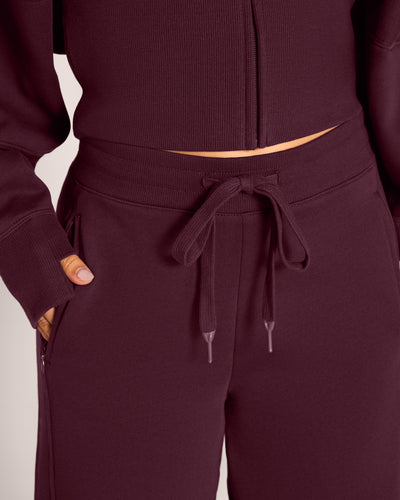 Close up of drawstring at waist on Fleecey Wide Leg Pull-On Pant - Garnet