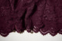 Close up detail shot of the bottom of Seamed Lushy Midi Dress - Lace Garnet