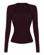 Outline image of Shapey Ruched Long Sleeve Top - Garnet
