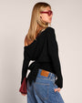 Back view of model wearing Sashy Wedge Long Sleeve Top - Black/Lace Black