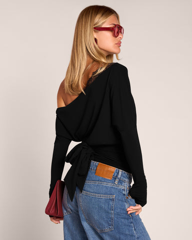 Back view of model wearing Sashy Wedge Long Sleeve Top - Black/Lace Black