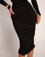 Close up of bottom of dress on Shapey Ruched Long Sleeve Midi Dress - Black