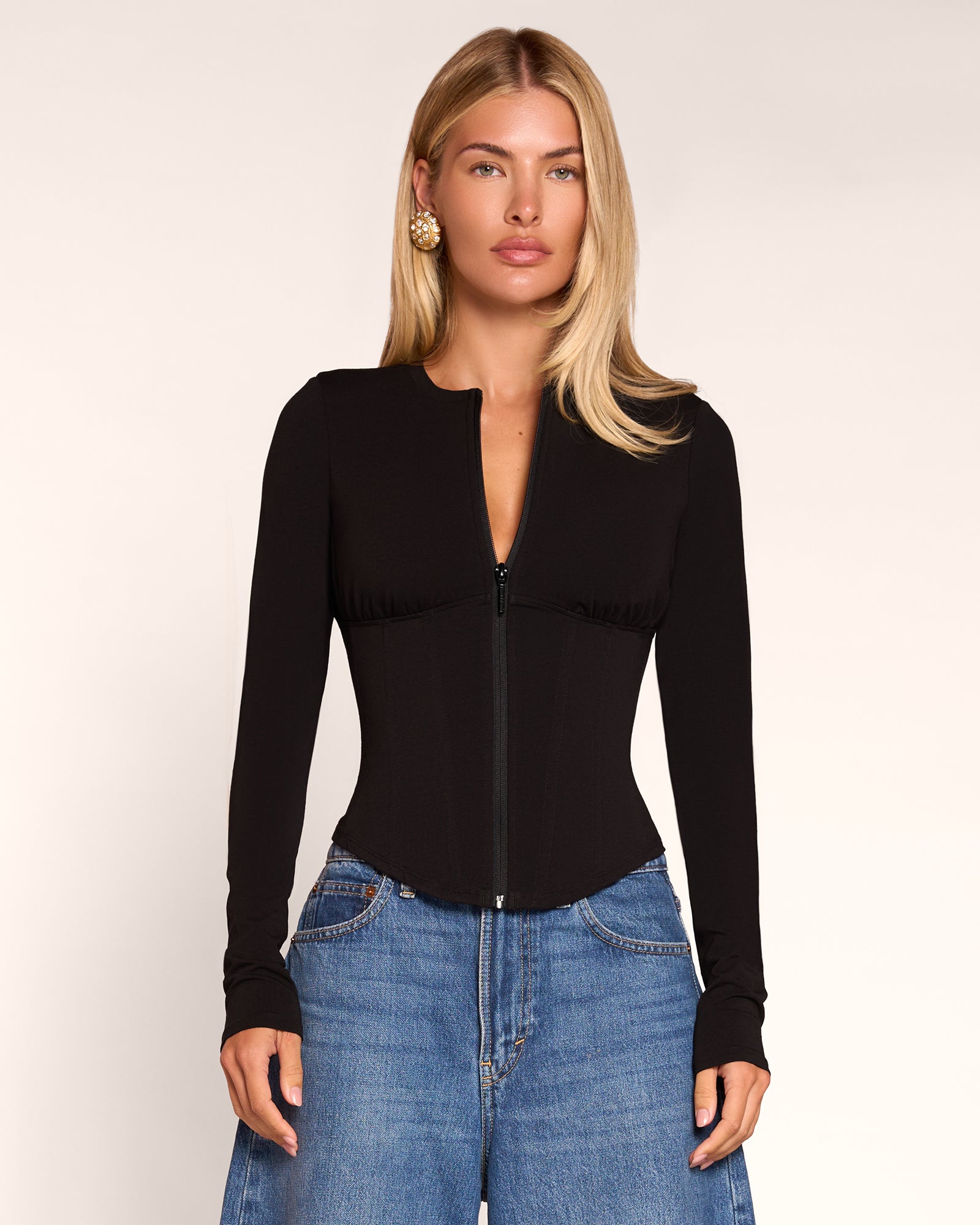 Front view of model wearing Corsety Long Sleeve Top - Black 