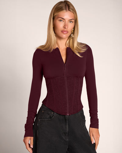 Front view of model in Corsety Long Sleeve Top - Lace Garnet/Garnet 