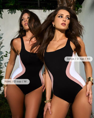 Two models posing together in Squarey - Contour Black/Rose/White wearing different sizes