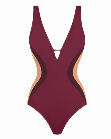 Back view of model wearing Plungey Triangle - Contour Ruby/Garnet/Tawny tummy control swimsuit