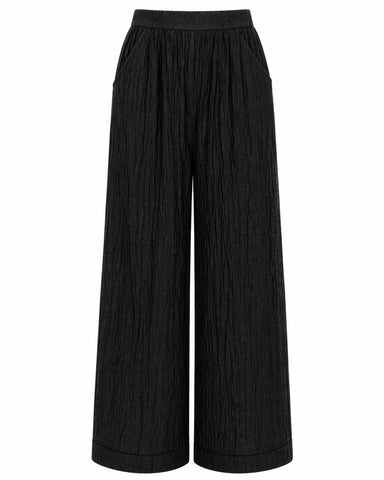 Full body front view of Seersucker Gauze Flowy Pant - Black on model