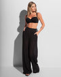 Full body front view of Seersucker Gauze Flowy Pant - Black on model