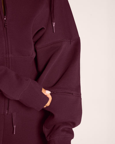 Close up of hidden pockets on Croissant Fleecey - Garnet