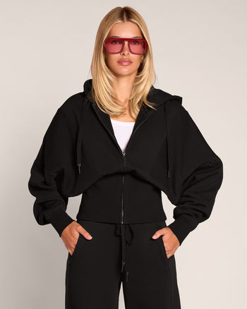 Model wearing Croissant Fleecey - Black front view